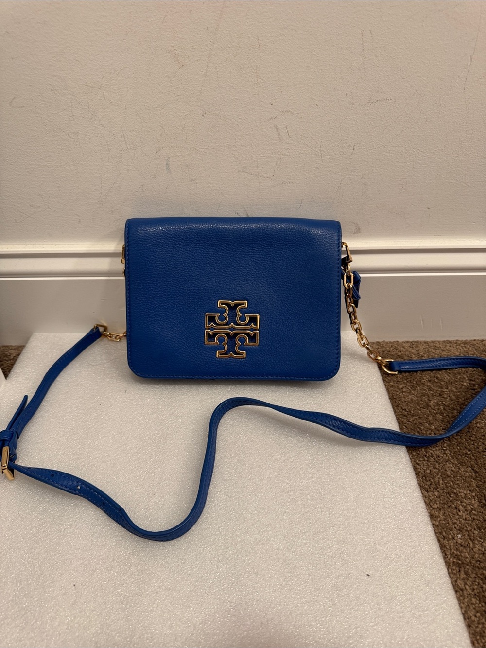 Tory Burch Cobalt Britten Pebbled Leather Crossbody bag with Gold Logo